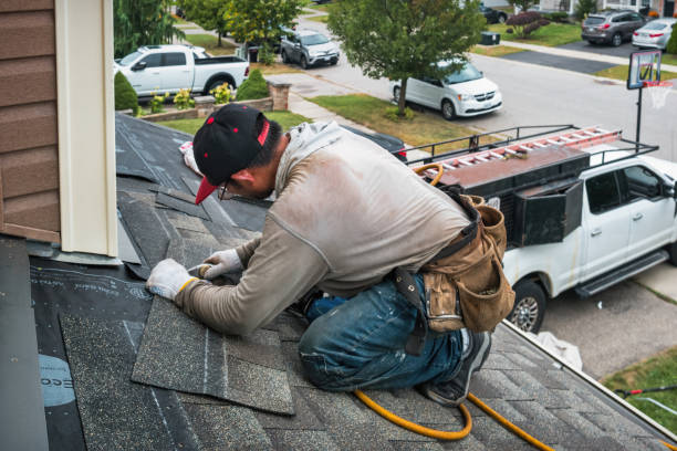 Professional Roof Replacement technician working in Hamburg, NJ
